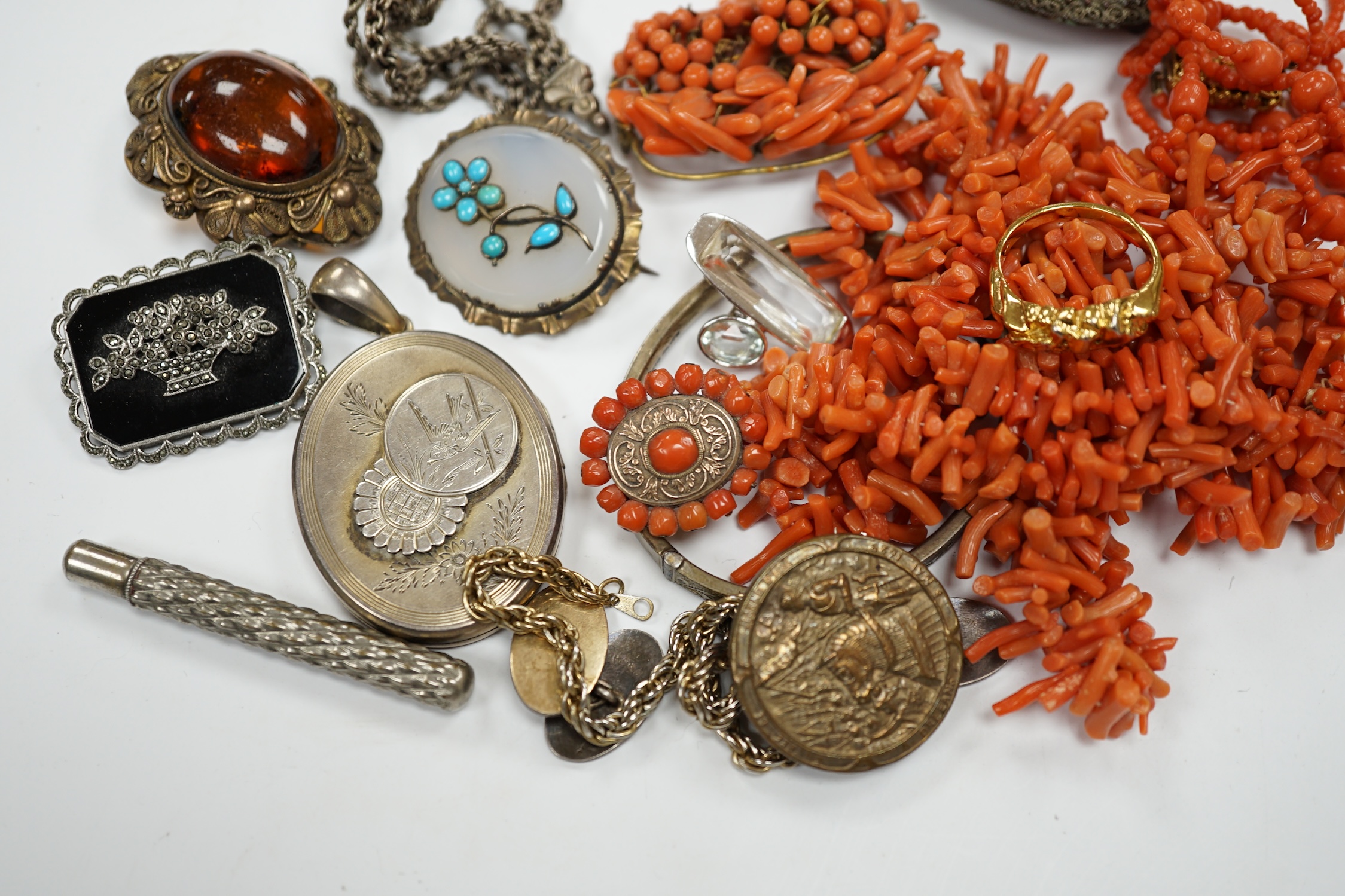 A group of assorted jewellery including costume, coral necklaces, chalcedony and turquoise set brooch, sterling bangle etc. Condition - poor to fair